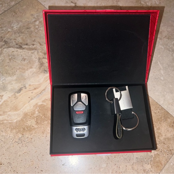 1 AUDI KEYFOB,3 KEY CHAINS, 1 Audi RED BOX, 1 Audi BOOKLET WALLET - Picture 4 of 14